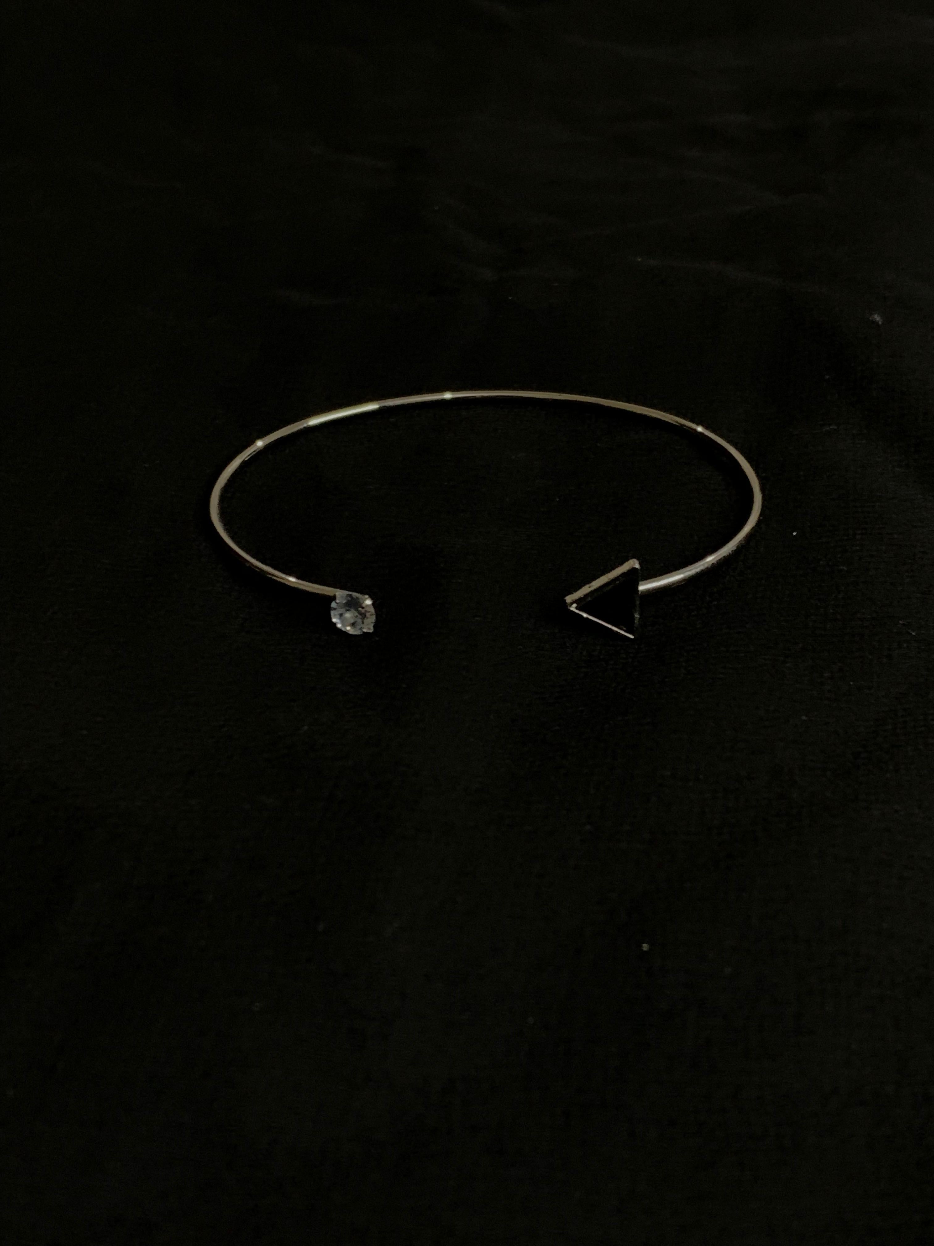 Silver-Tone Open Cuff Bangle with Crystal Accent and Black Triangle End