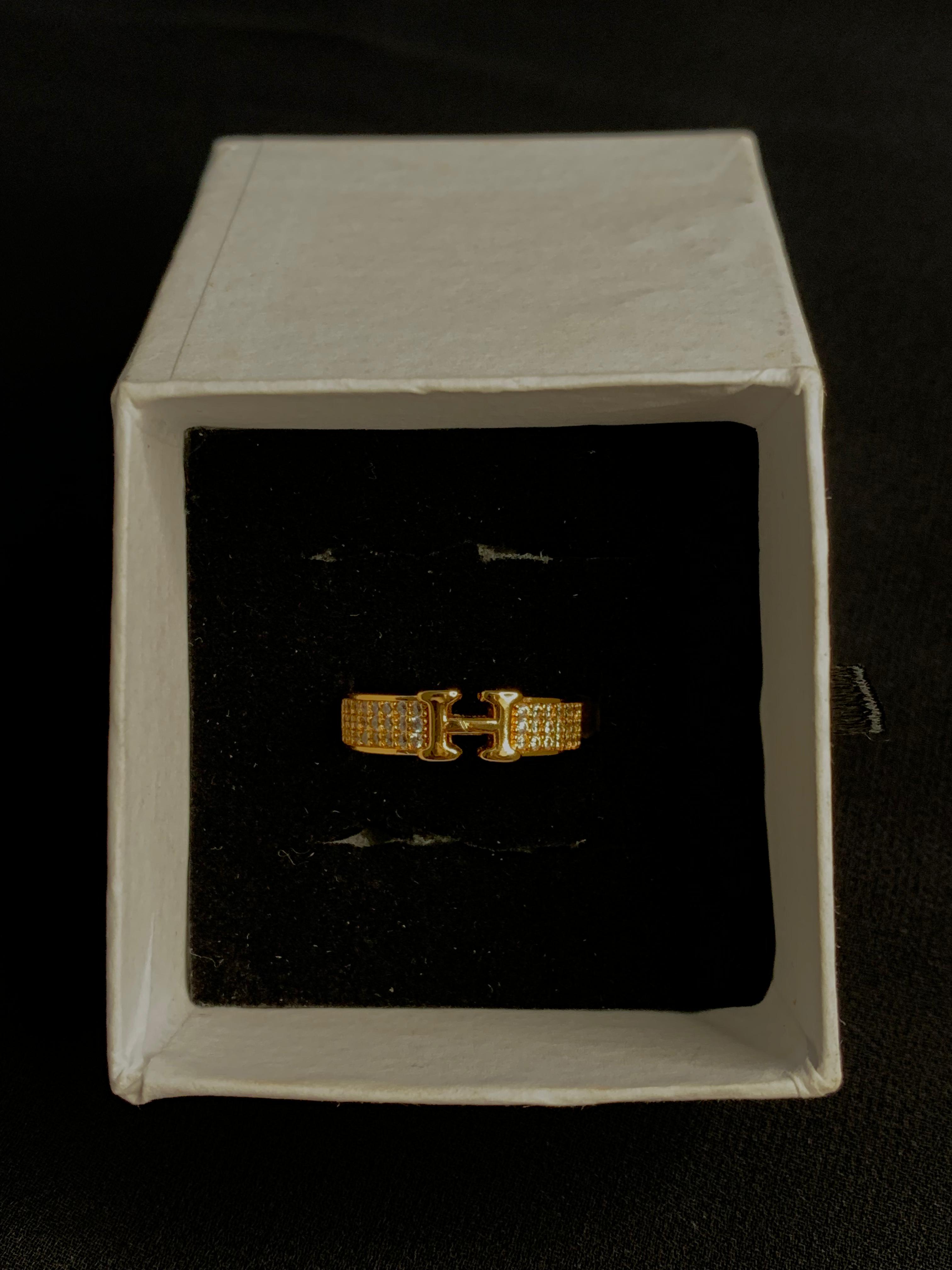 Gold toned H Initial Ring