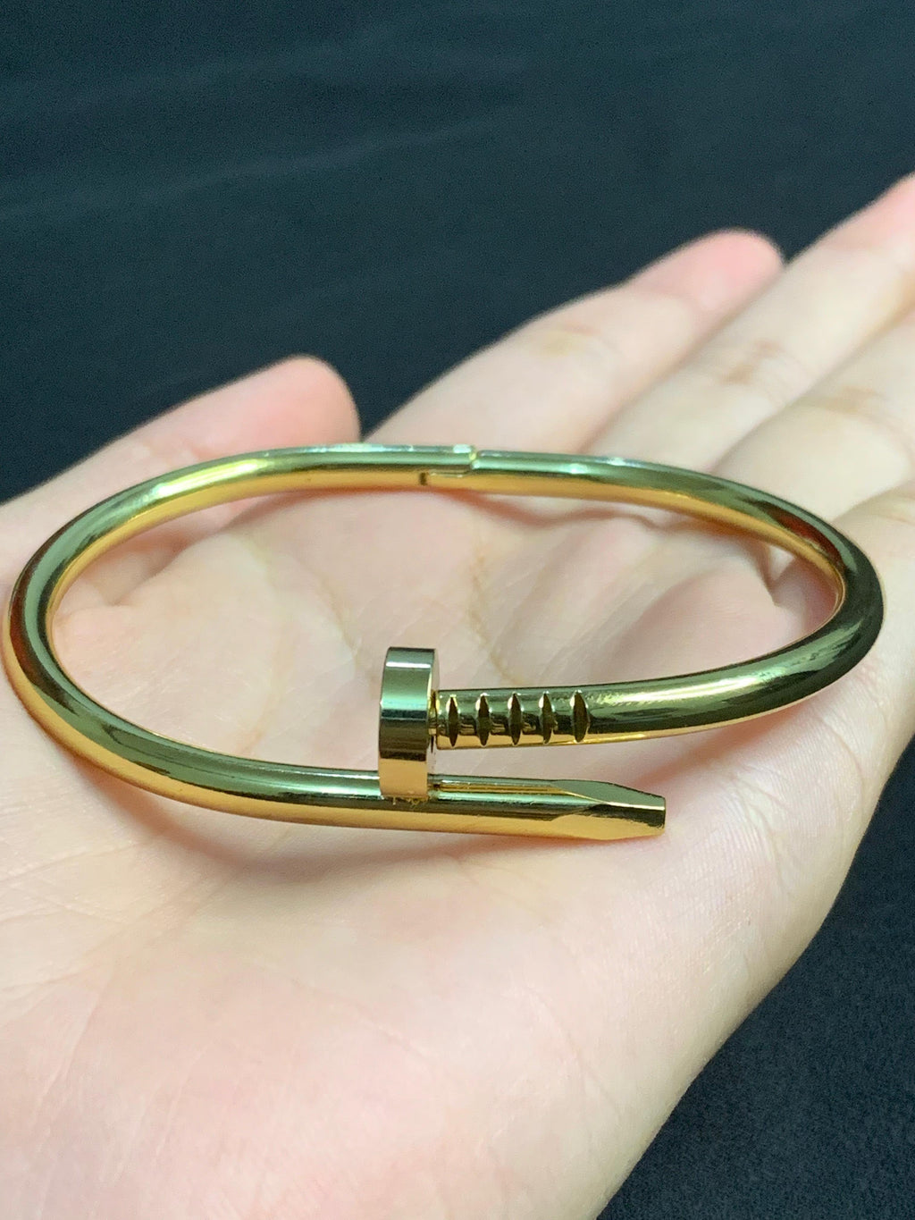 Gold-Tone Nail Clasp Bangle Bracelet
